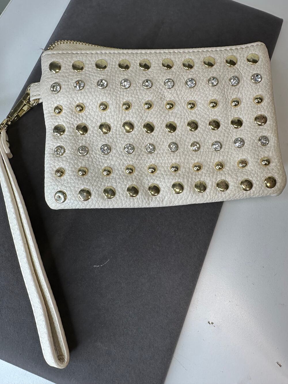 Charming Charlie’s ivory studded clutch/wristlet
